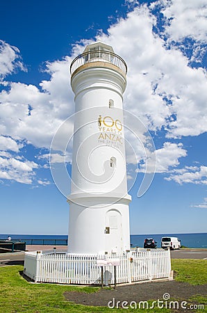 Kiama Harbour Light, is an active lighthouse, is located close to the Blowhole Point. The image was taken in cloudy day. Editorial Stock Photo